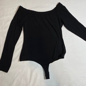 Black body suit off the shoulders